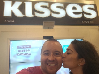 Get it? Kisses in front the Kisses sign?!